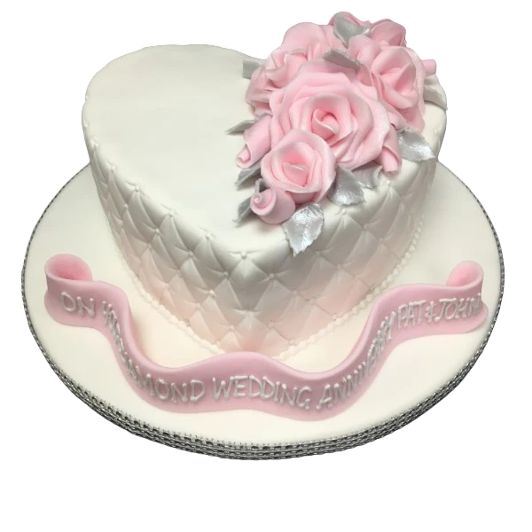 Bespoke celebration cake with quilted heart design and pink rose decorations in Solihull, West Midlands.
