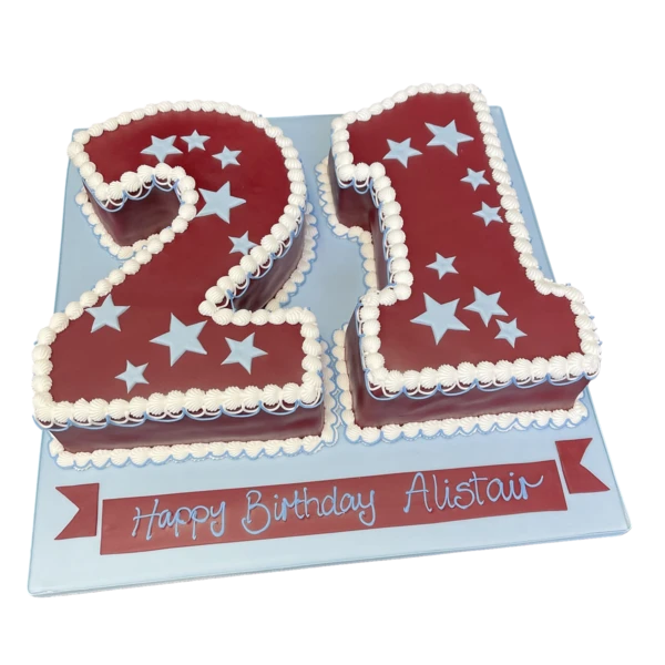 Bespoke number 21 cake decorated with silver stars for a celebration in Solihull, West Midlands.
