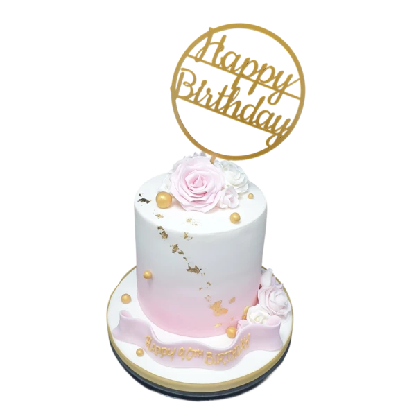 Bespoke celebration cake with gold leaf accents and intricate piping, crafted in Solihull, West Midlands.