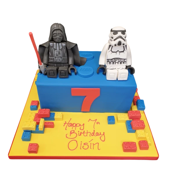 Lego Darth Vader and Storm Trooper designed cake perfect for a themed celebration. Bright colors and intricate details ideal for a themed party.