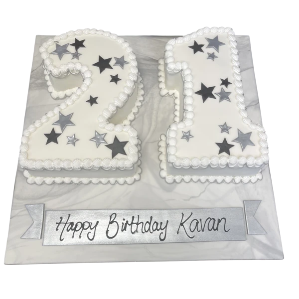 Bespoke cake with intricate floral designs and elegant piping, perfect for celebration in Solihull, West Midlands.