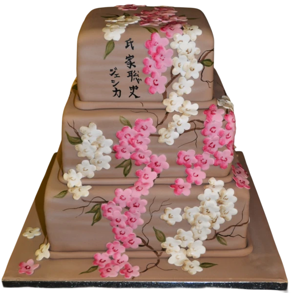 Three-tier wedding cake with sugar paste cherry blossoms in pink and white.
