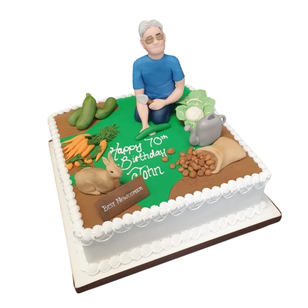 Bespoke celebration cake in Solihull, West Midlands, decorated with colorful fondant vegetables and garden tools.