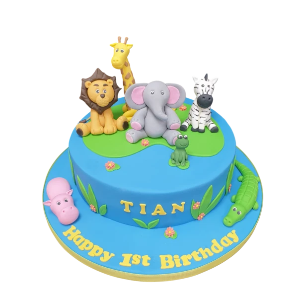 Delightful animal-themed cake decorated with cute creatures on lily pads. Perfect for themed parties and celebrations.