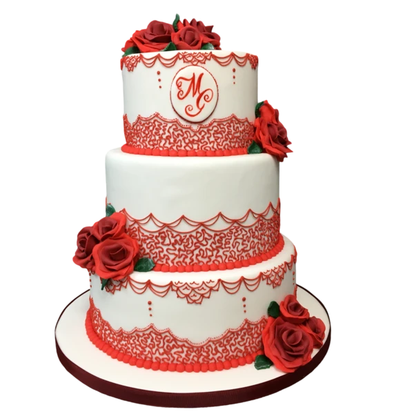Three-tier wedding cake with red lace and sugar roses, elegant design.