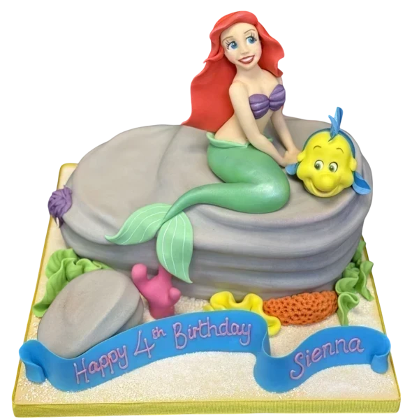A beautifully decorated cake featuring a popular underwater princess character, perfect for themed celebrations and parties in UK.