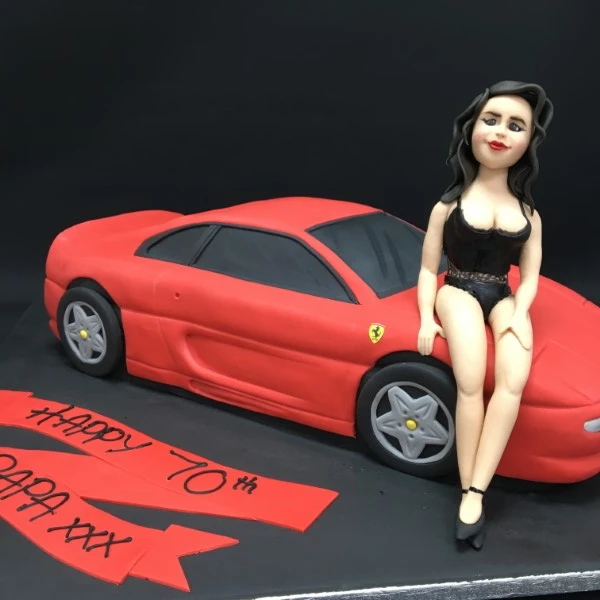 Bespoke celebration cake with intricate floral designs and gold accents in Solihull, West Midlands.