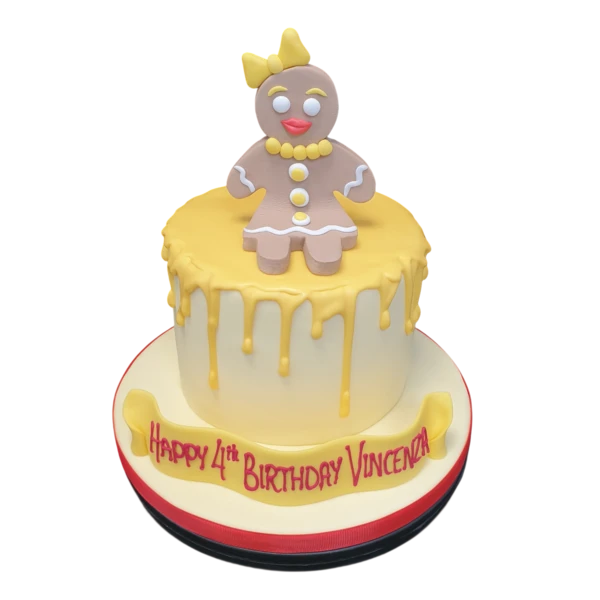 A beautifully decorated gingerbread woman-shaped cake with a playful design, perfect for special occasions and celebrations.