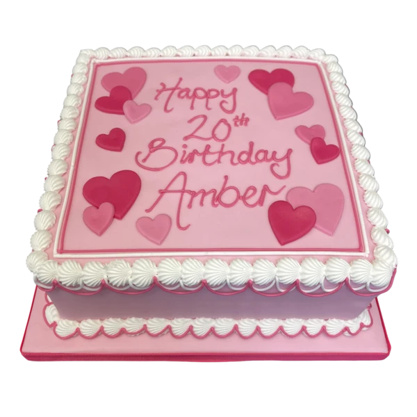 Square bespoke cake decorated with red and pink heart shapes for celebration in Solihull, West Midlands.