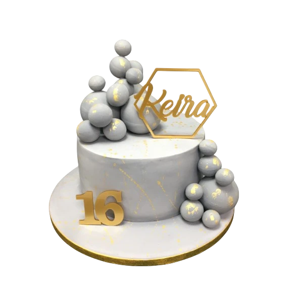 Elegant and festive cake with colourful ball decorations on top, perfect for celebrations and special occasions.