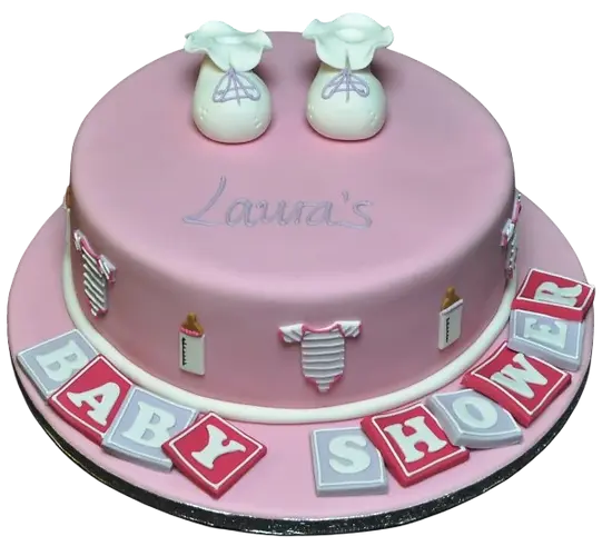 Bespoke celebration cake in Solihull, West Midlands featuring edible baby booties and decorative tile patterns.