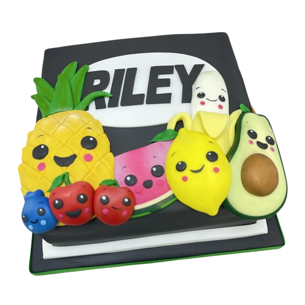 Bespoke Hey Bear Sensory Fruit cake with colorful fruit shapes, designed for celebration in Solihull, West Midlands.
