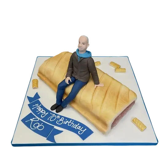 Bespoke sausage roll cake shaped with golden pastry layers, perfect for celebration in Solihull, West Midlands.