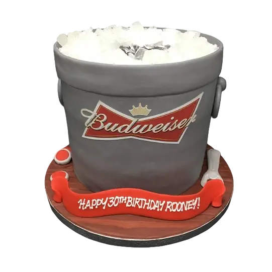 Bespoke Budweiser bucket cake with realistic ice and bottle details, crafted for celebration in Solihull, West Midlands.