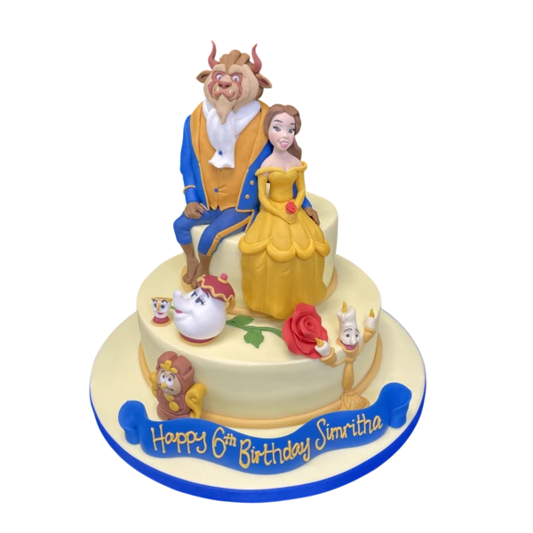 A beautifully decorated and enchanting cake inspired by the tale of Beauty and the Beast, perfect for a fairy tale themed celebration.