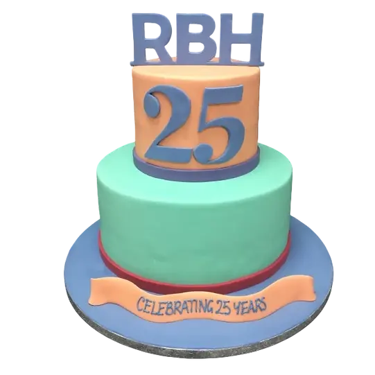 Bespoke celebration cake with intricate RBH initials in gold, set on a white fondant base in Solihull, West Midlands.