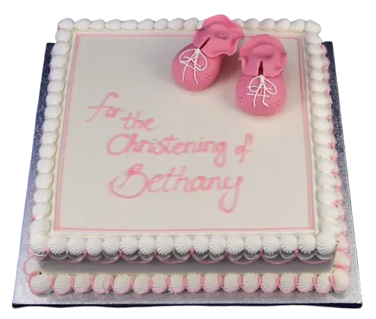Bespoke cake shaped like baby booties with pastel pink and blue icing, decorated for a celebration in Solihull, West Midlands.