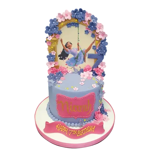 Bespoke Encanto-themed cake with vibrant colors and character decorations, crafted in Solihull, West Midlands.