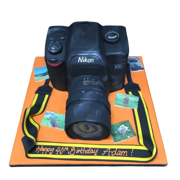 A beautifully decorated camera-themed cake with intricate details, perfect for photography enthusiasts and special occasions.