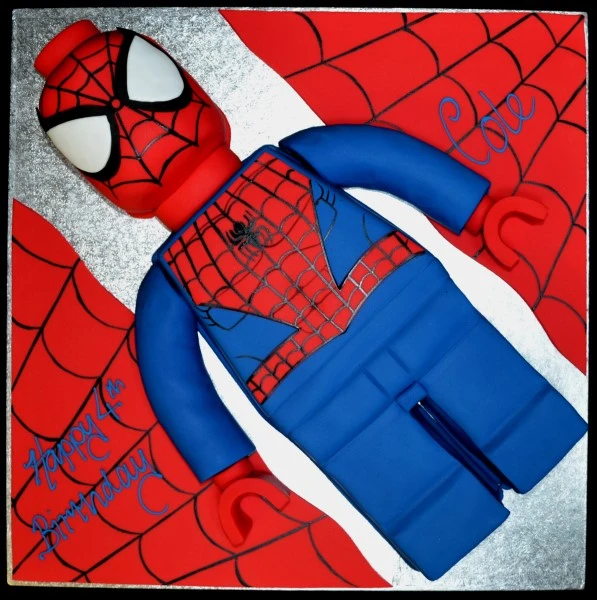 A playful and colorful Spiderman Lego Man cake, perfect for birthdays and themed parties. Unique design with vibrant colors and intricate detailing.