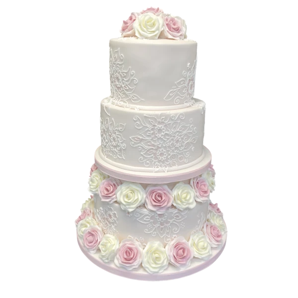 Three-tiered wedding cake with white sugar paste and pink, ivory roses.