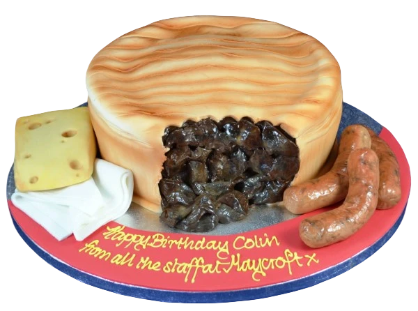 Bespoke steak pie cake with realistic crust and filling design, crafted for a celebration in Solihull, West Midlands.