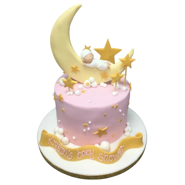 A charming cake featuring a sleeping baby under a crescent moon decoration, perfect for baby showers or birthdays. Handcrafted with intricate details.