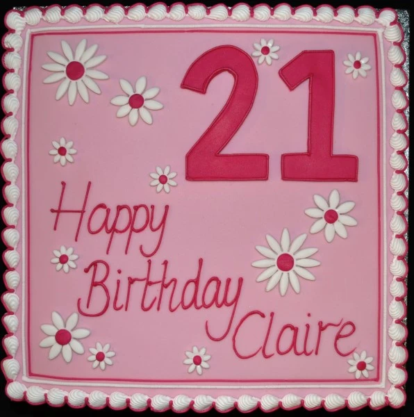 Bespoke square cake decorated with large white daisies and a bold number topper, crafted in Solihull, West Midlands.