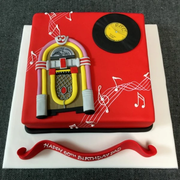 A unique and fun jukebox-themed square cake perfect for all music lovers and party enthusiasts in the UK.