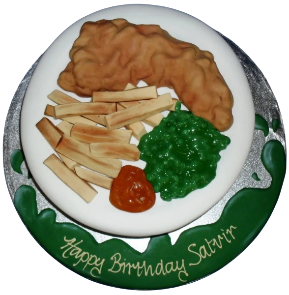 Bespoke cake shaped like fish and chips with golden battered fish and crispy fries in Solihull, West Midlands.