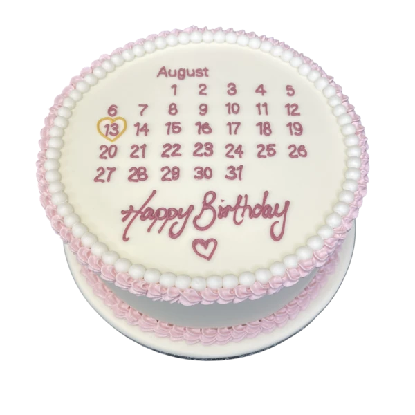 A stunning cake decorated with intricate calendar details, perfect for special occasions and celebrations.