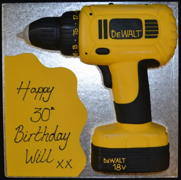 Stylish and innovative Dewalt drill-shaped cake ideal for DIY enthusiasts. Perfect for birthdays, celebrations, and special occasions.