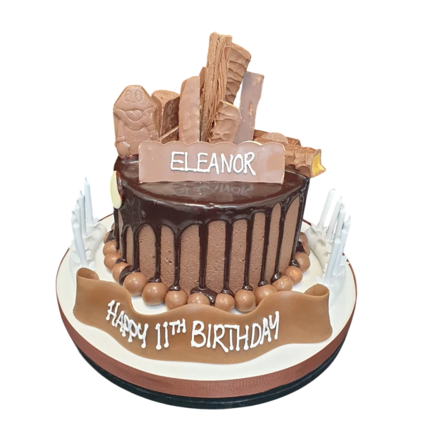 Bespoke Chocolate Riot cake with rich chocolate layers and decorative swirls, crafted in Solihull, West Midlands.