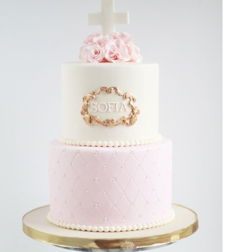 Bespoke celebration cake with intricate floral icing and gold accents in Solihull, West Midlands.
