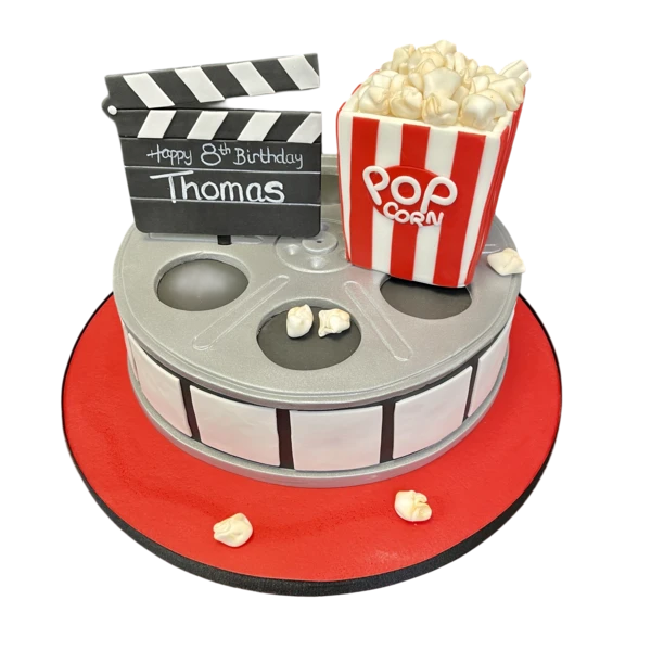 A delicious cinema-themed cake inspired by popcorn and movies, perfect for film enthusiasts and special occasions.