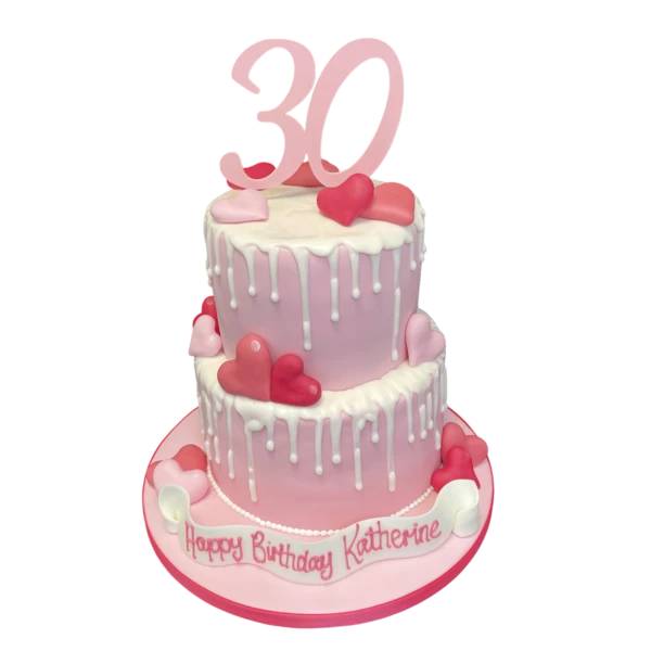 Bespoke Drippy Heart Drip cake with red glaze and heart decorations, perfect for celebration in Solihull, West Midlands.