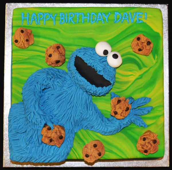 Bespoke Cookie Monster cake with blue frosting and large googly eyes, perfect for celebration in Solihull, West Midlands.