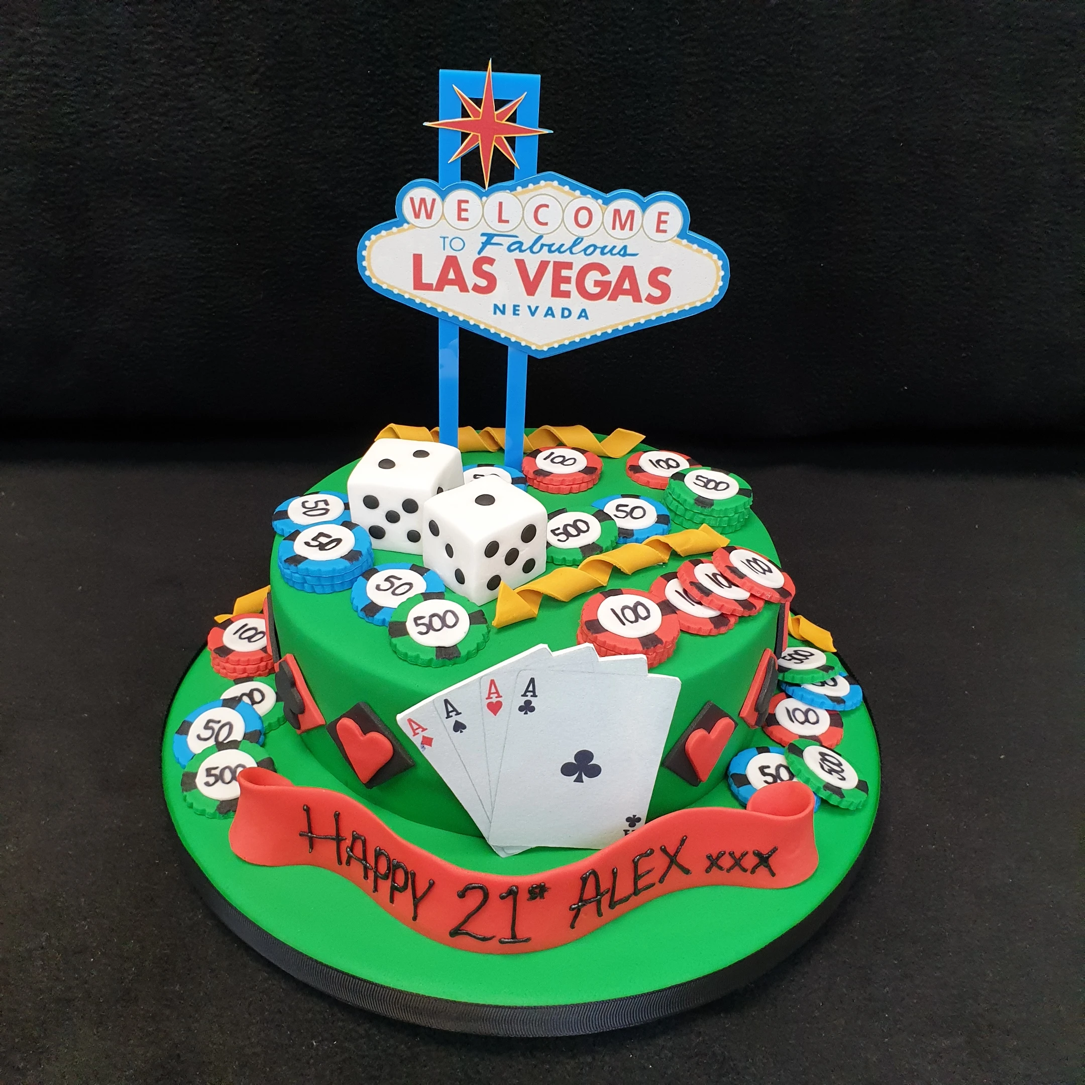 Bespoke Las Vegas-themed cake with playing cards and dice decorations, crafted in Solihull, West Midlands.
