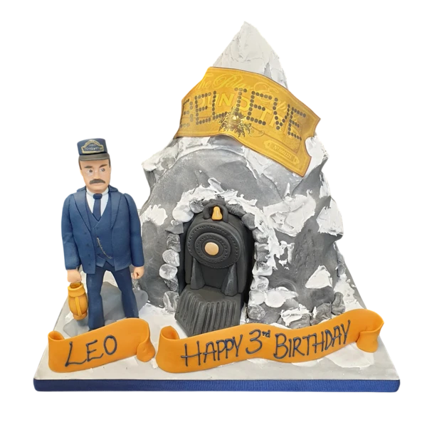 Bespoke Polar Express cake with snowy train design and festive details, crafted in Solihull, West Midlands.