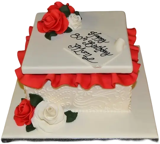 Bespoke celebration cake in Solihull, West Midlands shaped like a gift box adorned with red fondant roses.