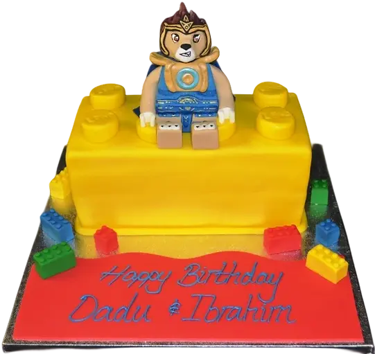 Bespoke LEGO brick cake with vibrant red and yellow fondant blocks, crafted for celebration in Solihull, West Midlands.