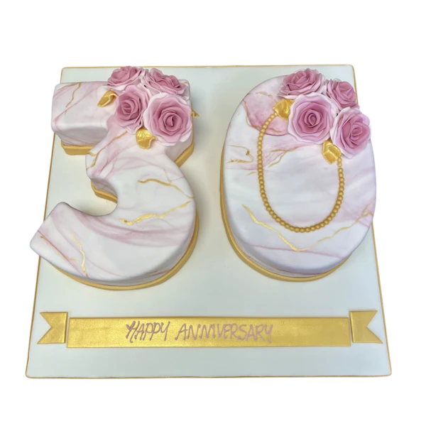 Stunning marble design birthday cake with elegant rose decorations for a 30th celebration, perfect for an elegant and stylish event in the UK.