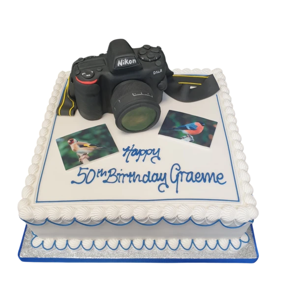Bespoke DSLR camera cake with intricate lens and buttons detail, crafted for celebration in Solihull, West Midlands.