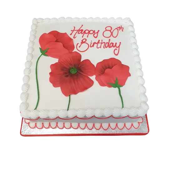 Bespoke celebration cake decorated with vibrant red poppies, crafted in Solihull, West Midlands.