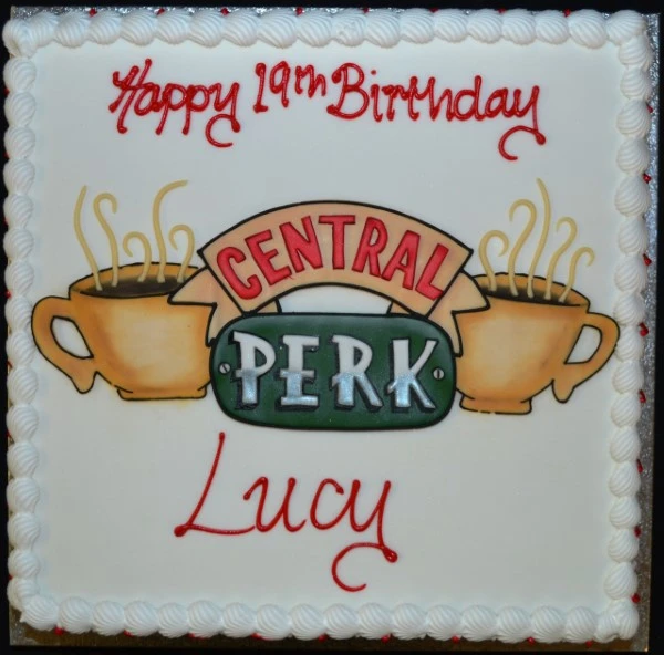 A beautifully decorated Central Perk themed cake, ideal for any Friends TV show fan.