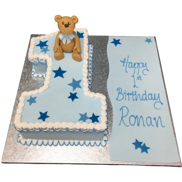 Bespoke celebration cake in Solihull, West Midlands featuring a teddy bear and number-shaped design with pastel colors.