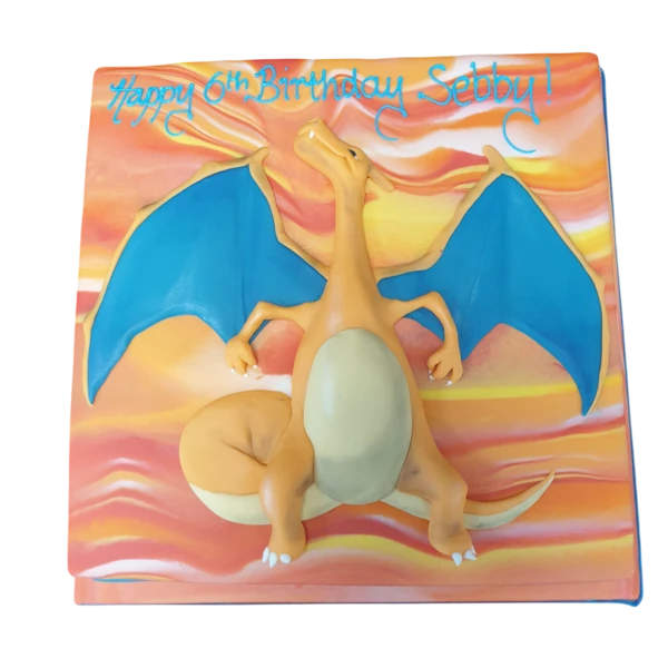 Bespoke Charizard Pokemon cake with fiery wings and detailed scales, perfect for celebration in Solihull, West Midlands.