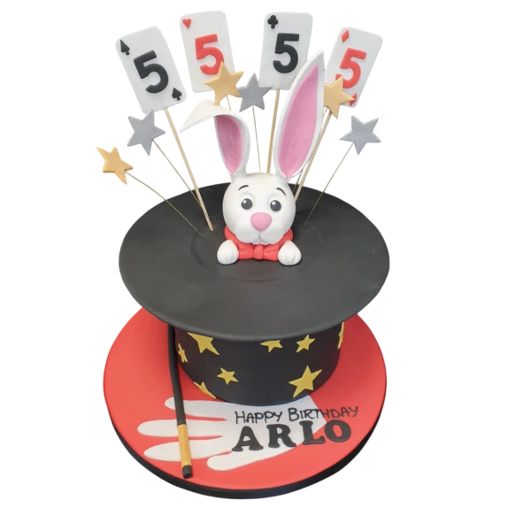 Bespoke cake featuring a detailed rabbit popping out of a magician’s hat, crafted in Solihull, West Midlands.