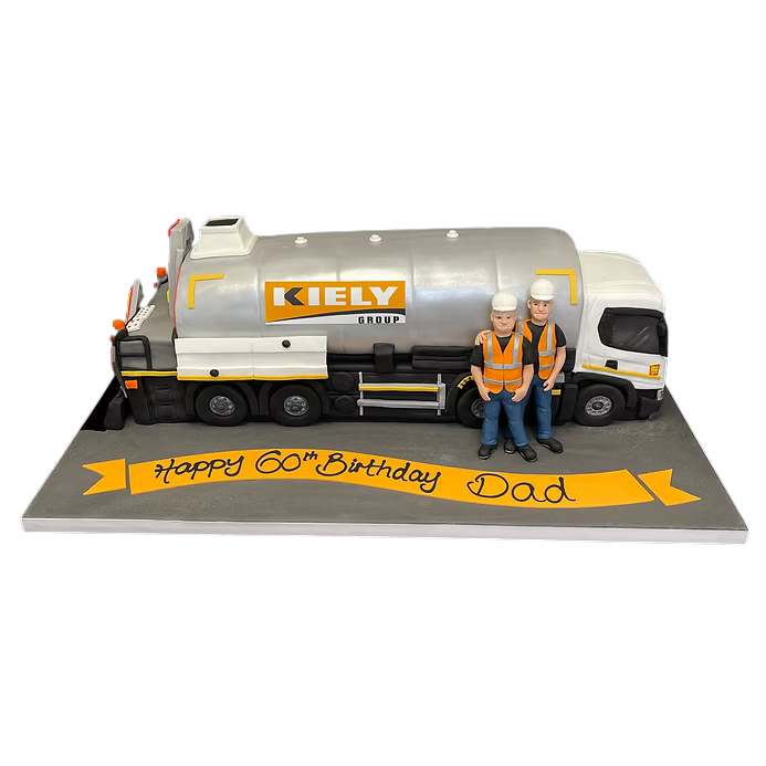 Bespoke massive tanker cake with detailed wheels and pipes, crafted for celebration in Solihull, West Midlands.