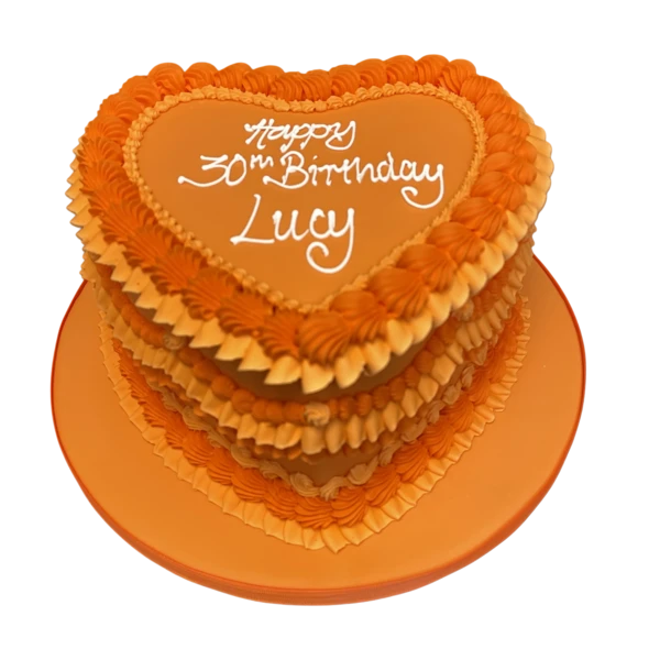 Bespoke celebration cake with intricate floral designs and gold accents in Solihull, West Midlands.